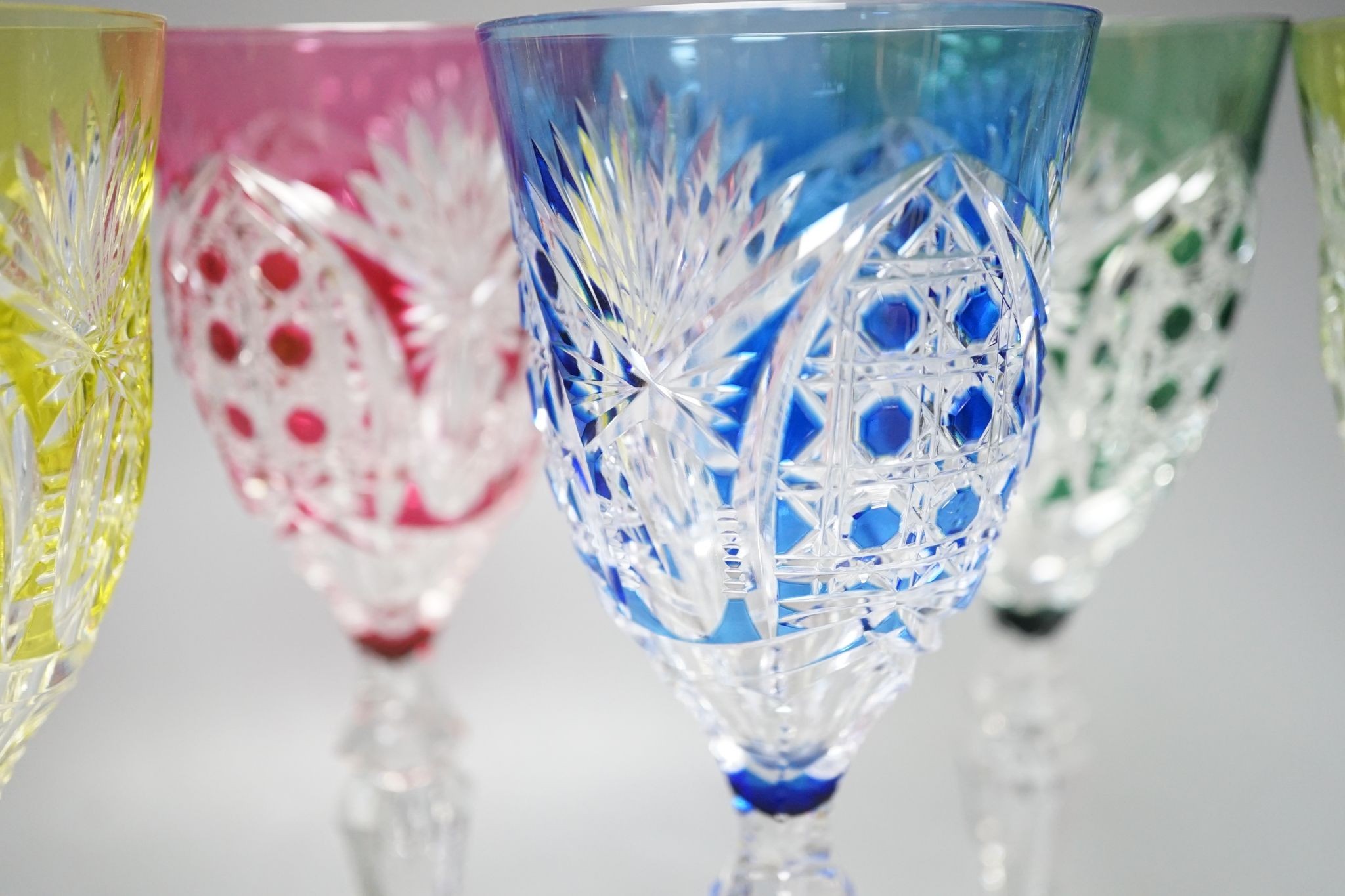 A harlequin set of 6 Val St Lambert colour flashed hock glasses, engraved marks, 21 cm high